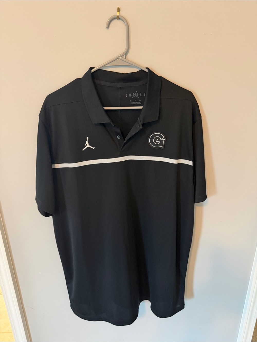 Jordan Black Polo with White Chest Stripe and Logo